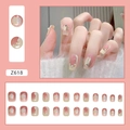Detail of pink blush press-on nails featuring elegant pearls and gold glitter accents - Z618 Ice Transparent Gummy Style