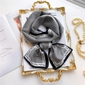 Elegant houndstooth silk scarf tied in a bow on a vintage gold tray with pearl accents - Black and White Houndstooth (LJ21-H105)