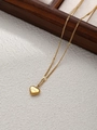Dettaglio del ciondolo a cuore dorato con incisione Love su una catena sottile - Oro-Love Inciso (ZHN13-Gold)