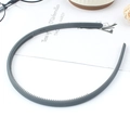 Minimalist matte dark grey plastic headband with anti-slip teeth for secure daily wear - Gray