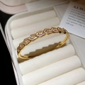 Macro detail of gold plated hexagon bangle with cubic zirconia pavé in a jewelry box - Hexagonal Snake Scale Pattern Style (5#)