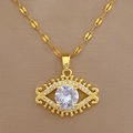 Macro shot of gold evil eye pendant with sparkling white cubic zirconia and pave rhinestones - Gold Evil Eye Pendant (F419)