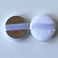 Two small round white crystal velvet powder puffs with ribbon handle shown next to a coin - Loose 35x7mm / White