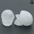 Carved natural white crystal skull figurine with translucent finish for Halloween decor - White Crystal