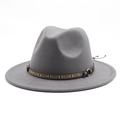 Detail view of grey wool fedora hat with ethnic patterned band and metallic buckle - Light Gray