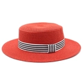 Detail of red boater straw hat featuring a chic black and white striped ribbon band - M (56-58cm) / Red