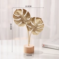 Décoration de feuille de monstera dorée en métal avec socle rond en bois massif - Double Feuille de Monstera-Or