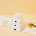 White drawer style jewelry gift boxes in four different sizes stacked on a pedestal - 5*5*3.5CM / White