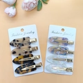 Eight acetate hair clips with leopard and marble patterns on a white card display - Special Value 8-Piece Set