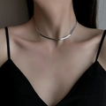Close-up of a silver flat snake chain necklace worn on a female neck for a minimalist look - Short Double Layer Snake Chain / Silver