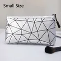 Detail of silver geometric triangle pattern PU leather makeup bag with zipper closure - Lattice Silver
