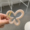 Elegant beige butterfly claw clip in glossy finish with golden spring for women - Light Nude Pink