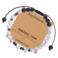 Detail of Be Brave Morse code bracelet with lava stone and white turquoise on kraft card - Anxiety lies