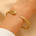 Elegant gold snake shaped open cuff bracelet with detailed scale texture and boho style - Snake-Shaped Open Design (DZ-233)