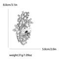 Silver-tone alloy flower brooch with pear-cut clear crystal and scroll pattern detail - Silver
