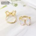 Adjustable golden butterfly ring set with iridescent crystals and shimmering accents - Rainbow