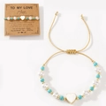Adjustable woven bracelet with blue turquoise beads, pearls, and gold heart charm - Pearl Turquoise Heart Gold String (ZZ-B24052601A-F)