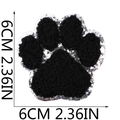 Close-up of black chenille dog paw embroidery patch with silver sequins and 6cm size scale - No.8 Black with Silver Edge