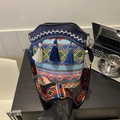 Ethnic style bucket bag featuring blue woven texture and colorful tassel fringe - Dark Blue