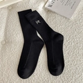 Ribbed black mid-calf cotton socks featuring small silver bow embroidery details - One Size / Black