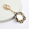 Porte-clés miroir en forme de fleur avec motif léopard en cuir PU et métal doré - Léopard Marron et Jaune