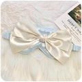 Light blue silk sleep mask with a large ivory bow and elastic headband detail - Light Blue