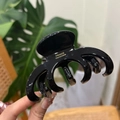 Primer plano de pinza de pelo negra brillante con inscripción dorada France Handmade - Negro-Etiqueta Dorada Engrosada Grande