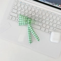 Green and white gingham checkered bow organizer pouch on laptop keyboard - Green Checkered Bowknot Accessory