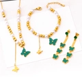 Elegant gold jewelry set with green butterfly charms and pearls including necklace and earrings - Three-Piece Set