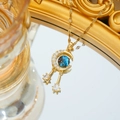 Collar de luna dorada con piedra estelar azul y flecos de estrellas de circonita - Piedra Galaxia Estrella y Luna con Borla (C510 Dorado)