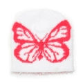 Dettaglio di un morbido berretto bianco con motivo jacquard a farfalla rossa prominente - M(56-58cm) / Bianco