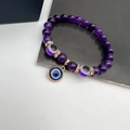 Purple Evil Eye crystal bead bracelet with luminous stones and gold zirconia accents - Natural Stone Purple