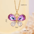 Collana a farfalla dorata con cristalli a goccia viola e bianchi e pietre di zircone - Farfalla Sfumata Blu Viola
