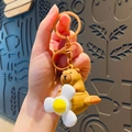 Cute Capybara pilot in yellow airplane keychain with brown metal ring accessory - Light Brown Propeller Plane Capybara