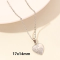 Silver heart pendant necklace with floral engraving and cross chain measuring 17x14mm - Silver-Retro Vine