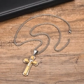 Detail of multi-layered gold and silver cross pendant on stainless steel chain over wood - With Chain / Gold and Silver Two-tone