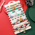 Set di bracciali natalizi multistrato con ciondoli a forma di Babbo Natale e perle - SY0627