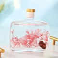 Preserved flower reed diffuser in pink with pine cone and square glass bottle - Encounter