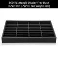 Detail view of 40-grid black bracelet display tray with 35x24x4cm dimensions - Black 40-Compartment Bracelet Tray