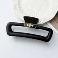 Elegant black square hair claw clip with golden cross pattern and border on marble background - Matte Black Gold Cross