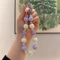 Beaded keychain with purple hearts and pearl white beads on a plastic spring ring - Purple White Combo