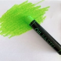 Single green oil pastel crayon for students showing rich color texture on white paper - Yellow & Green