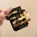 Three-piece acetate hair clip set featuring tortoiseshell and marble patterns on black card - Light Coffee Leopard Set