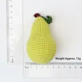Handmade crochet pear keychain in light green with size measurements 8cm height - Combed Cotton Knitted Pear