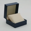 Navy blue faux leather watch box with lychee pattern and cream interior cushion - Blue Exterior Beige Interior
