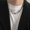 Titanium steel necklace with black braided chain and rectangular crystals worn by a model - Spliced Chain Necklace X2413
