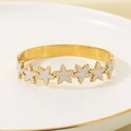 Detail view of golden starfish and palm tree charms on a stylish ocean beach bangle - Marble Texture Star Style (KB203126-SXSJ)