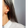 Close-up of vintage gold-plated red enamel earrings with white pearls on a female model - Style 3-Red