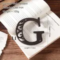 Vintage cast iron decorative letter G wall sign with rustic industrial textured finish - Letter G