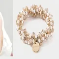 Élastique à cheveux élégant avec cristaux champagne et perles, utilisable comme bracelet - Cristal de perle champagne